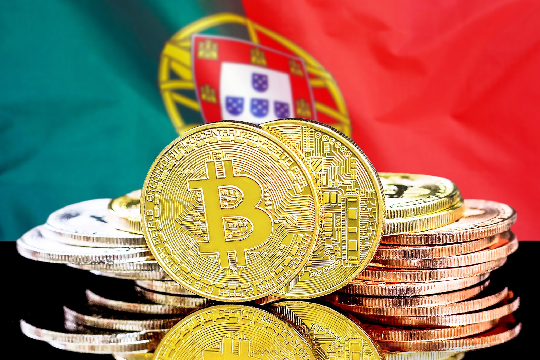 bitcoins on Portugal flag background