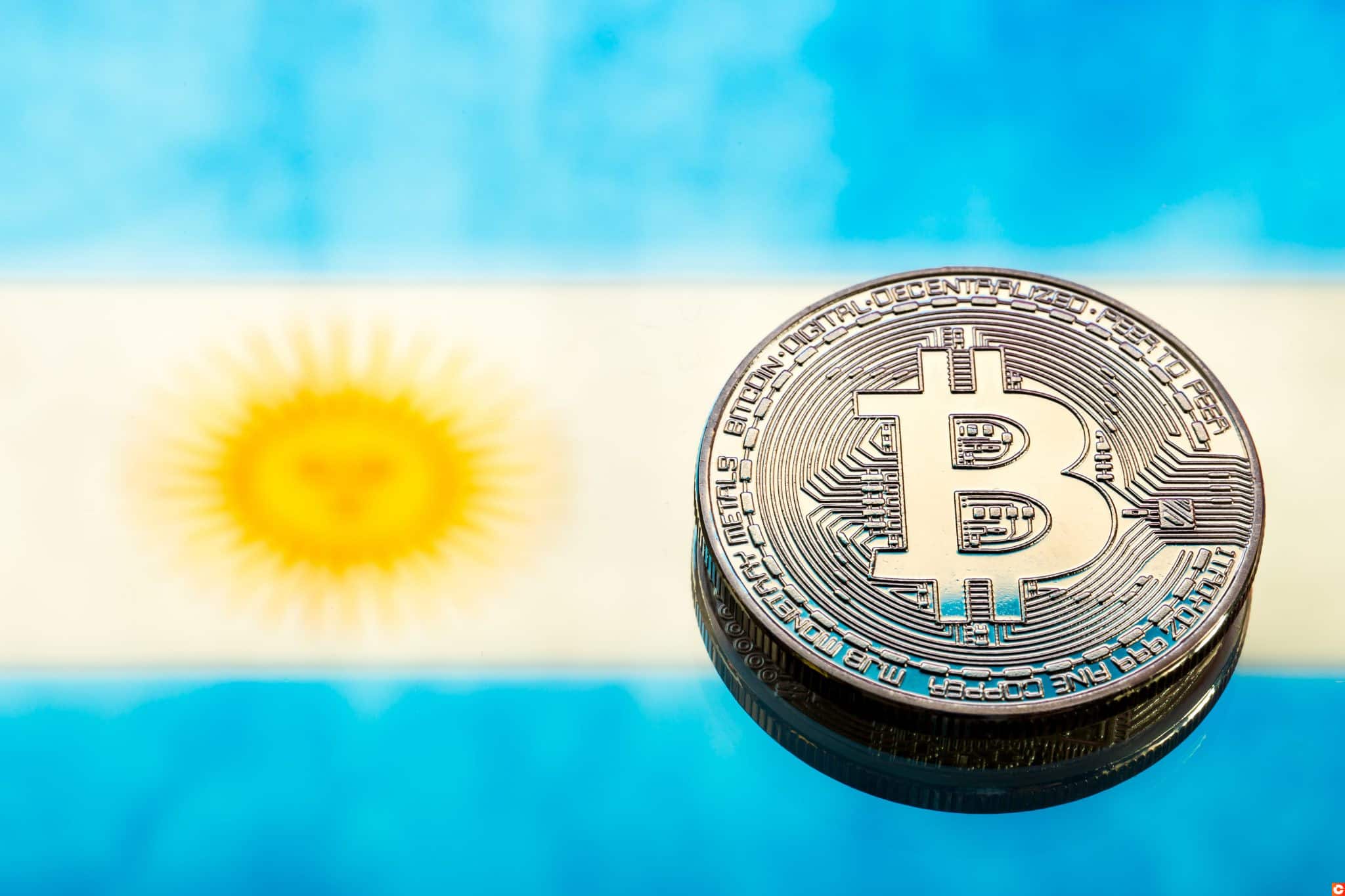 coins Bitcoin, against the background of Argentina flag, concept