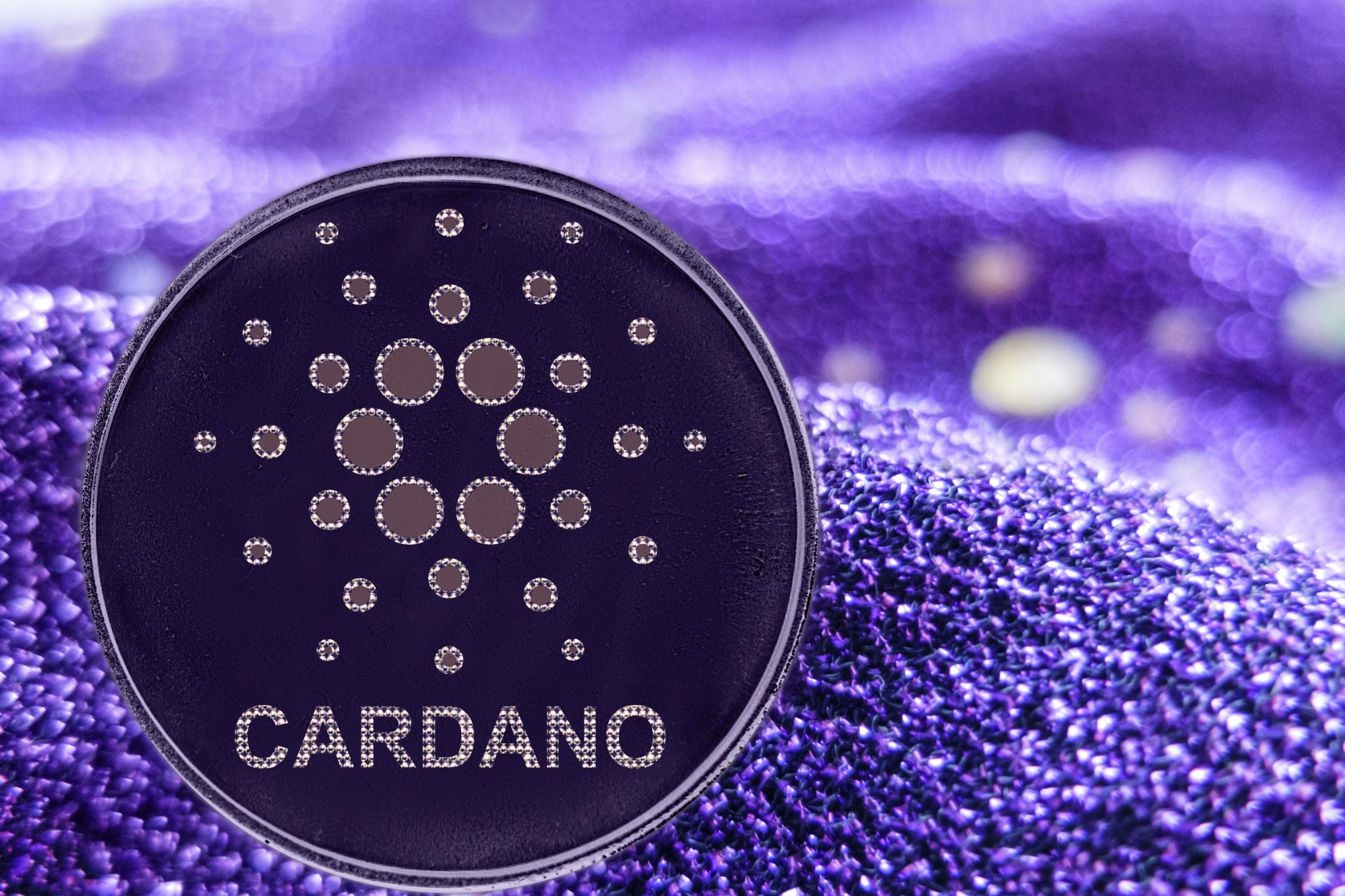 Coin cryptocurrency Cardano on modern neon background. ADA
