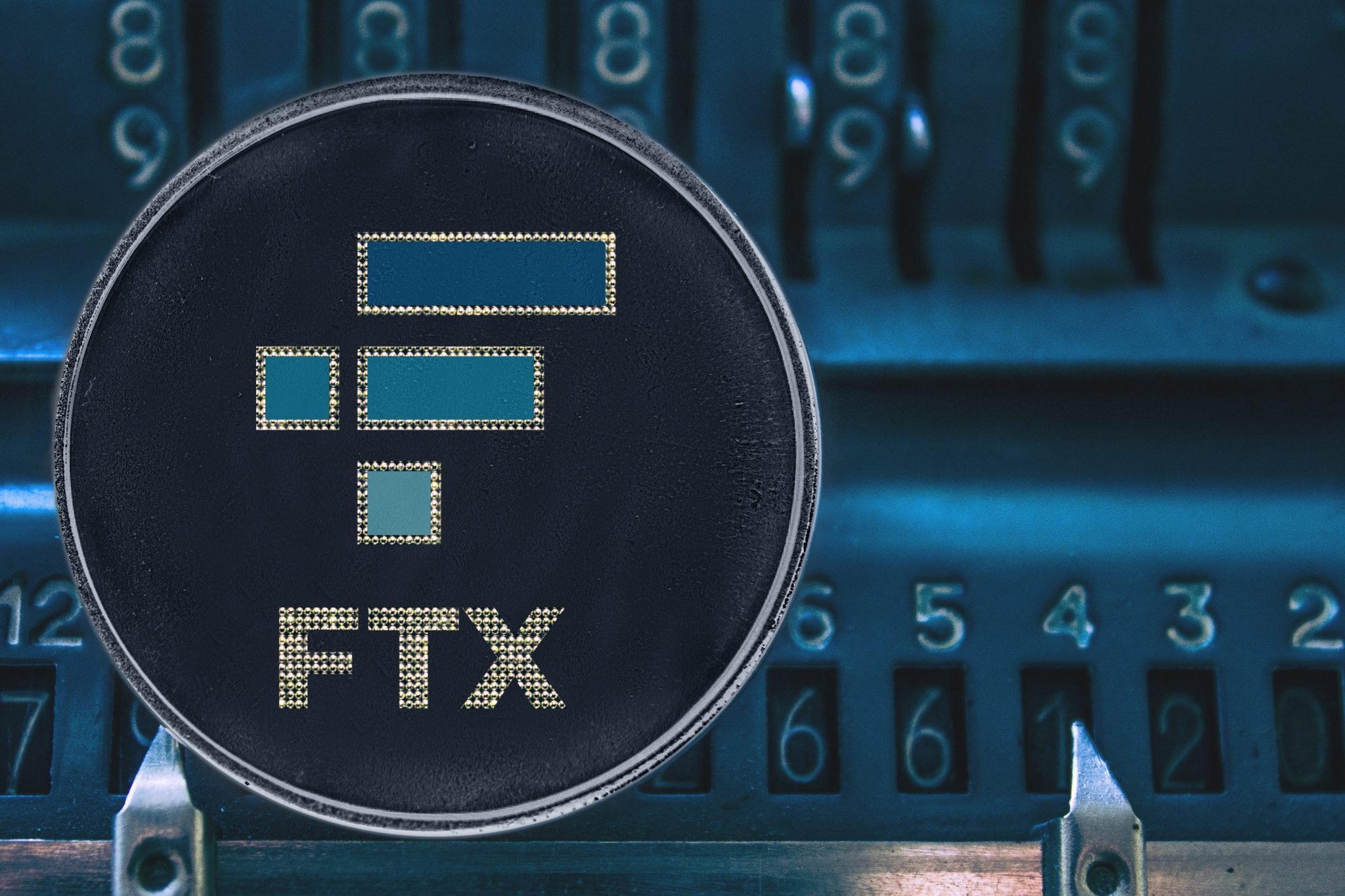 Coin cryptocurrency FTX against the numbers of the arithmometer.