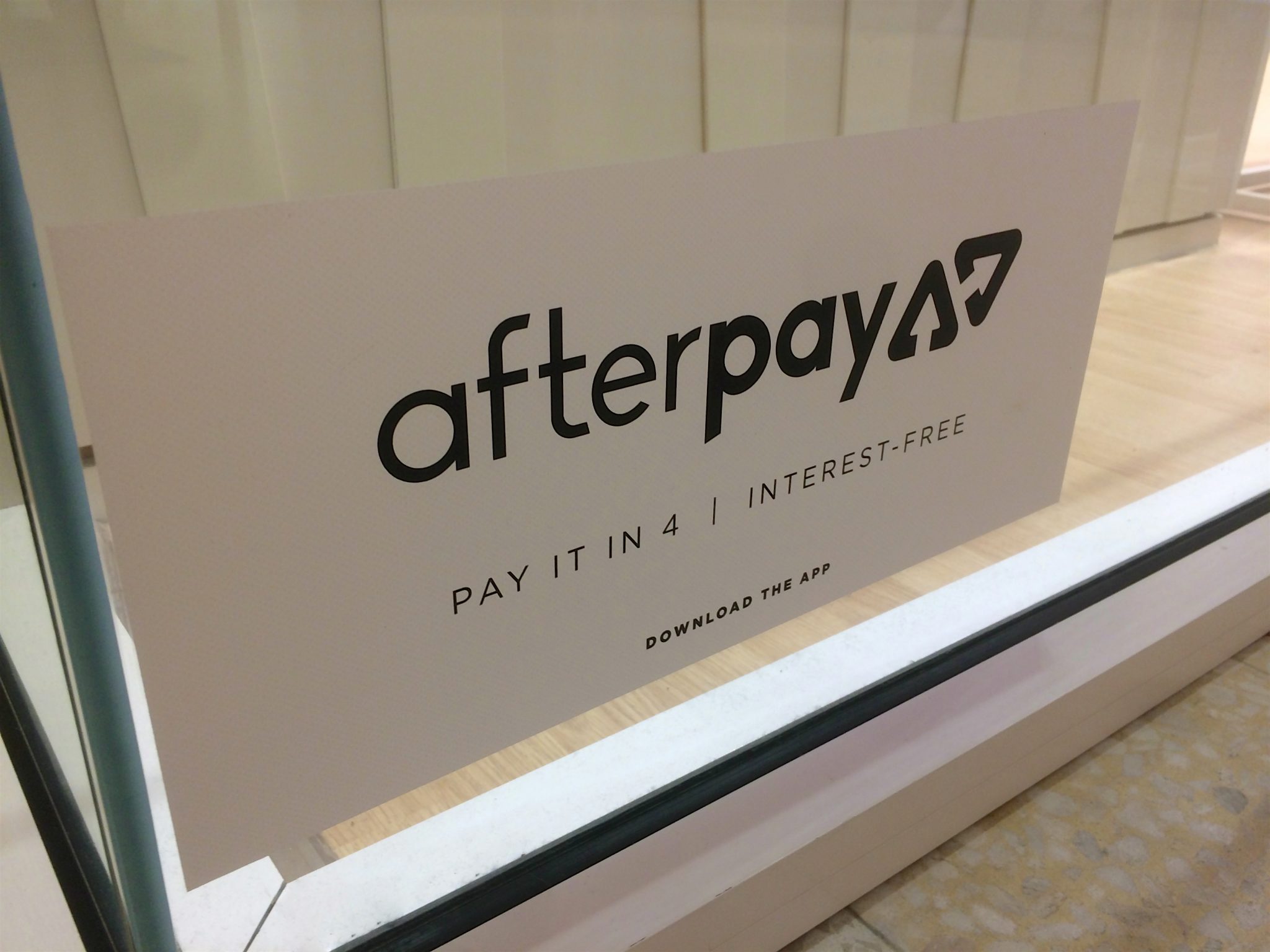 Moorachydore, QLD, Australia - 25th February 2020 : Afterpay App sticker placed on a shopfront window at the Sunshine Plaza Mall. Afterpay is a buy now pay later service provider