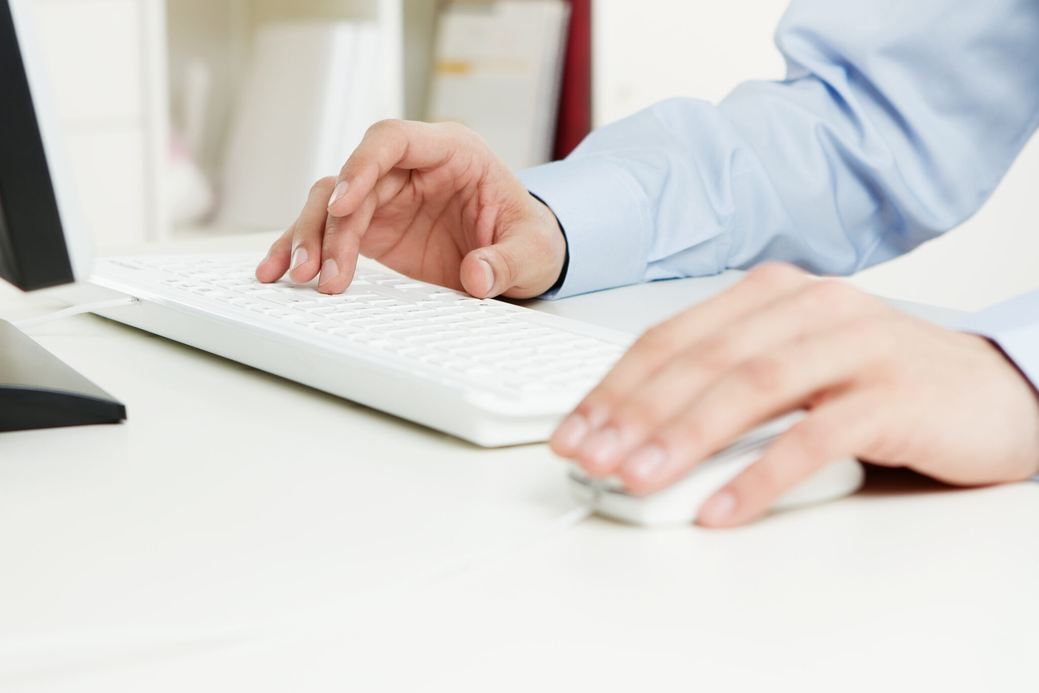 Human hands working on the computer