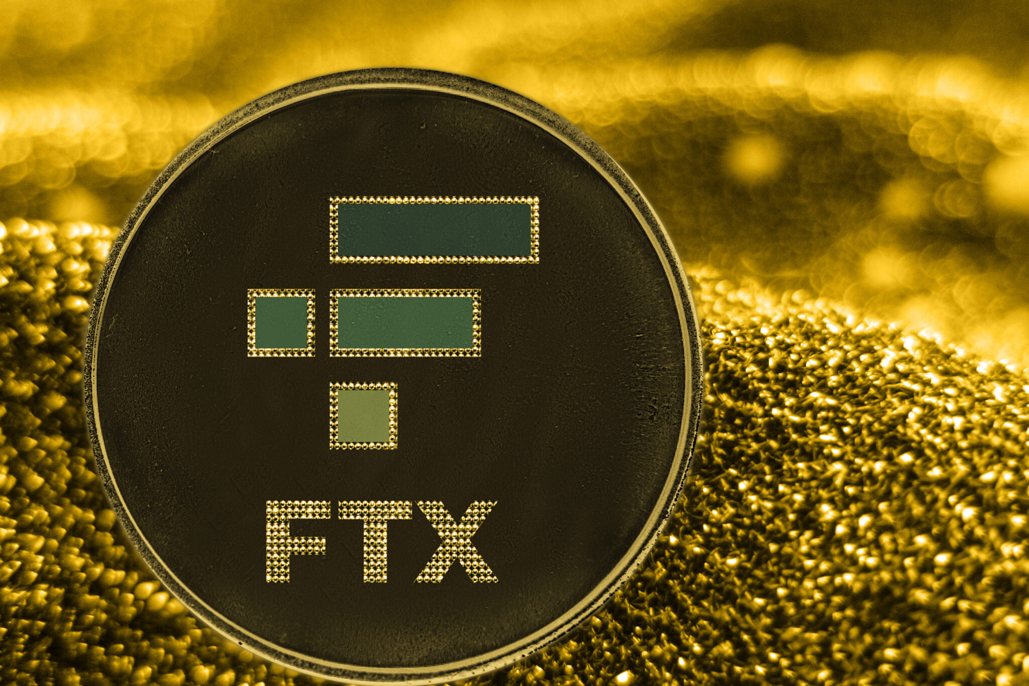 the coin cryptocurrency ftx token on golden background.