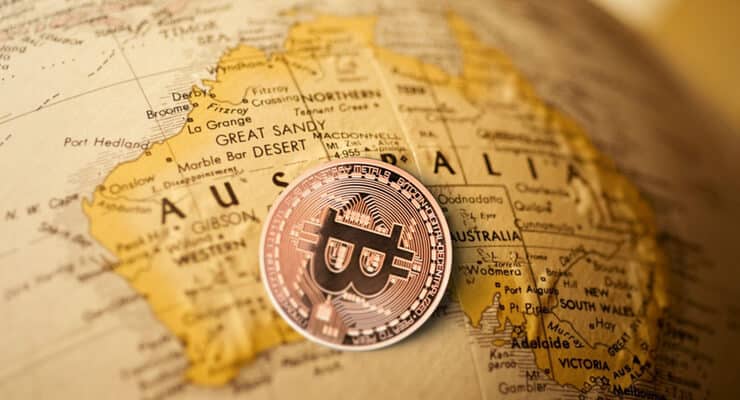 Carte de l'Australie avec une pièce de Bitcoin