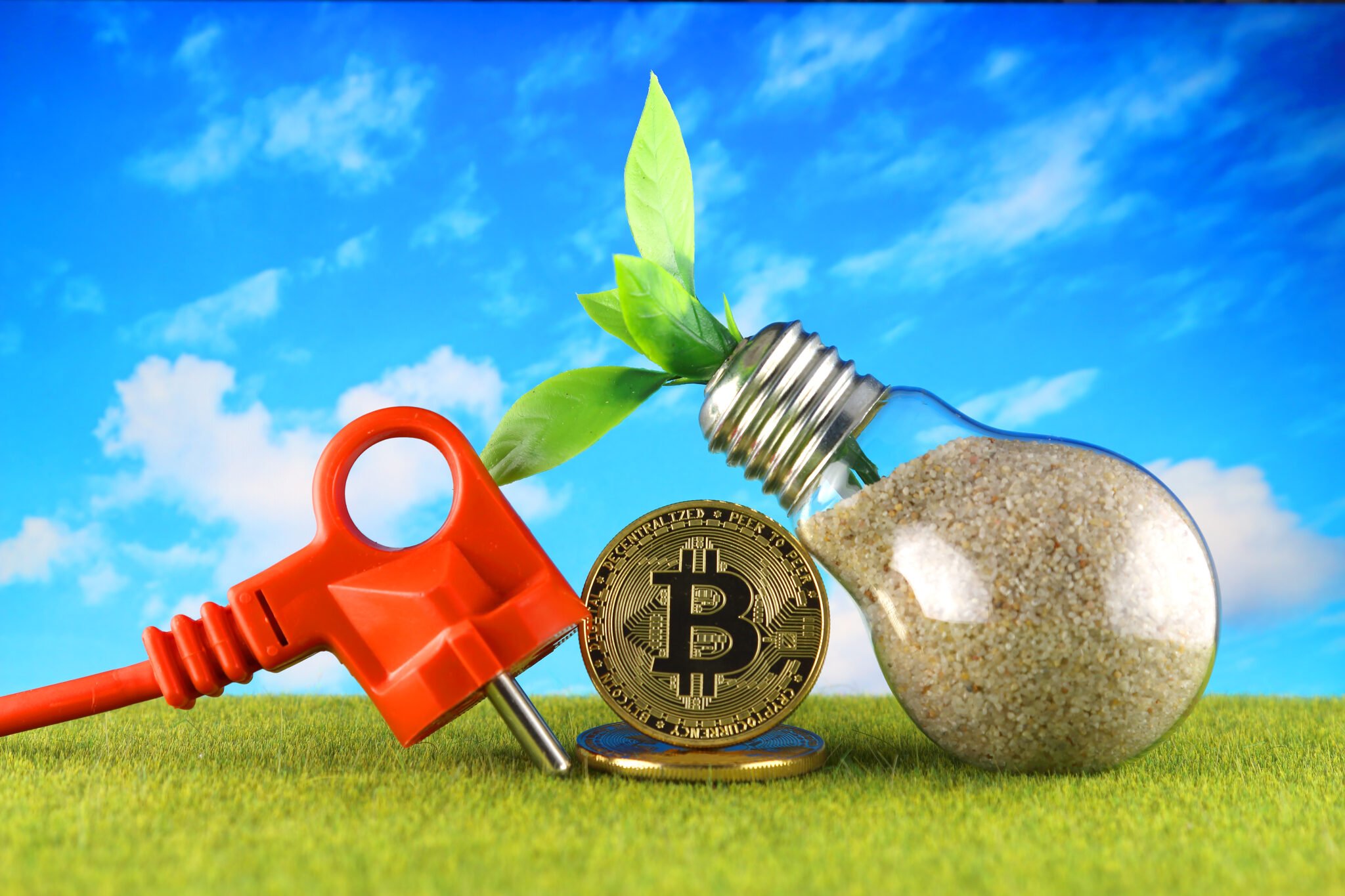 Bitcoin (BTC) and green, renewable energy concept. Electricity prices, energy saving in the cryptocurrency mining business.