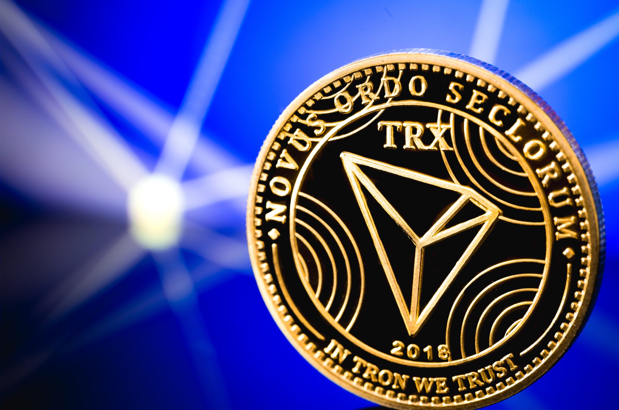 tron coin cryptocurrency on digital background