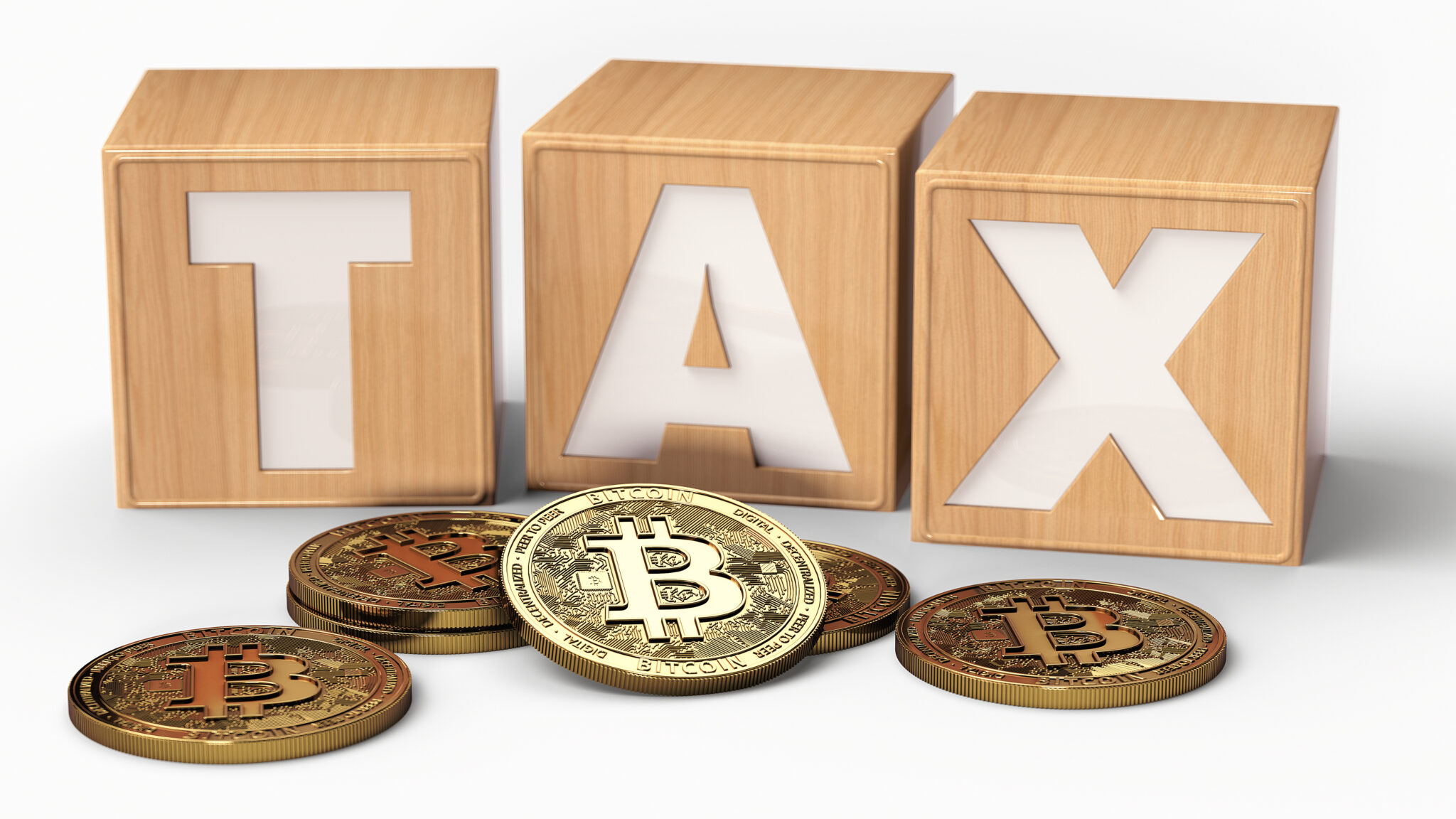 Wooden blocks with TAX letters on them and Bitcoin coins. Isolated 3D rendering