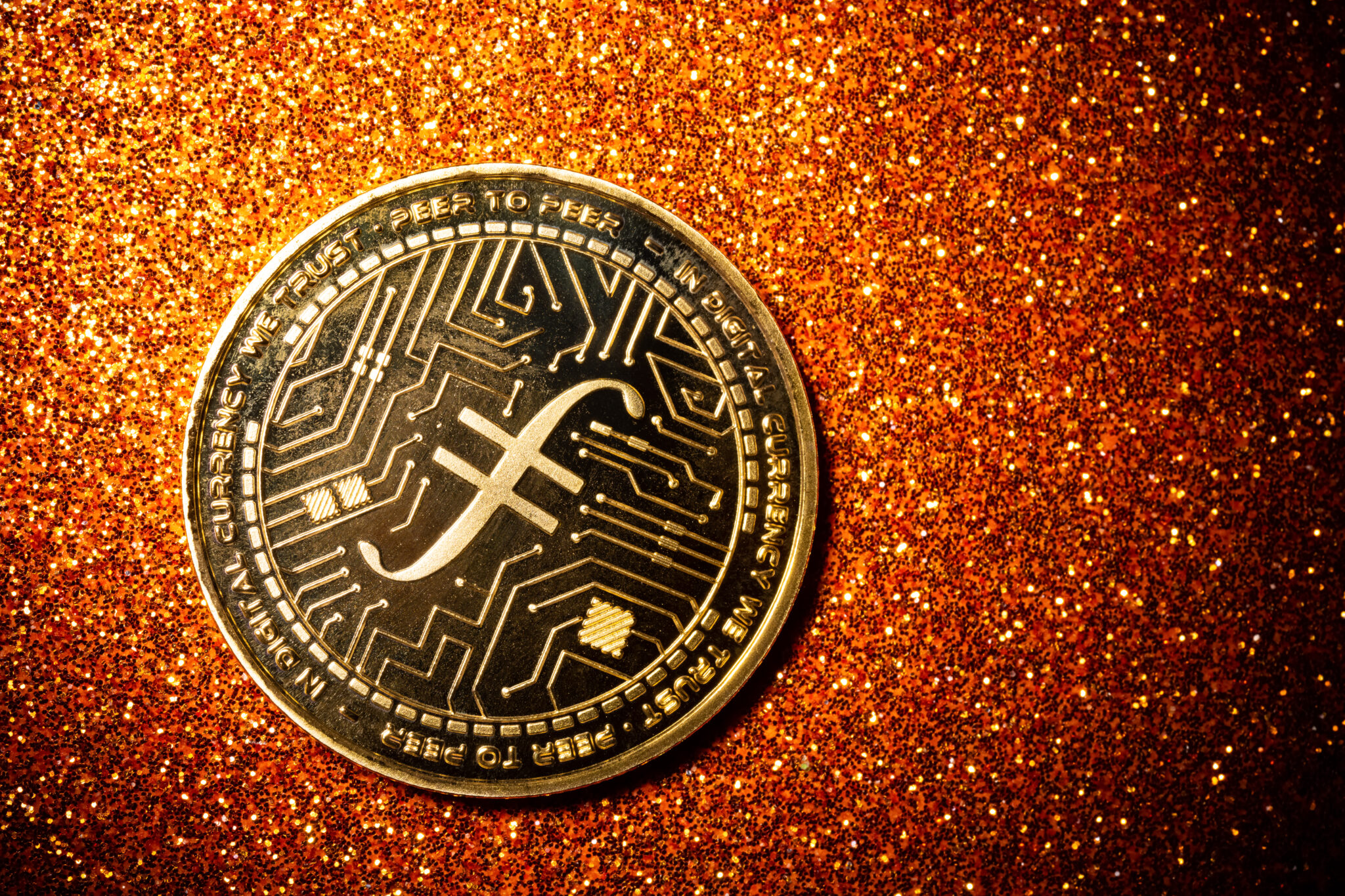 filecoin on a dark background close up