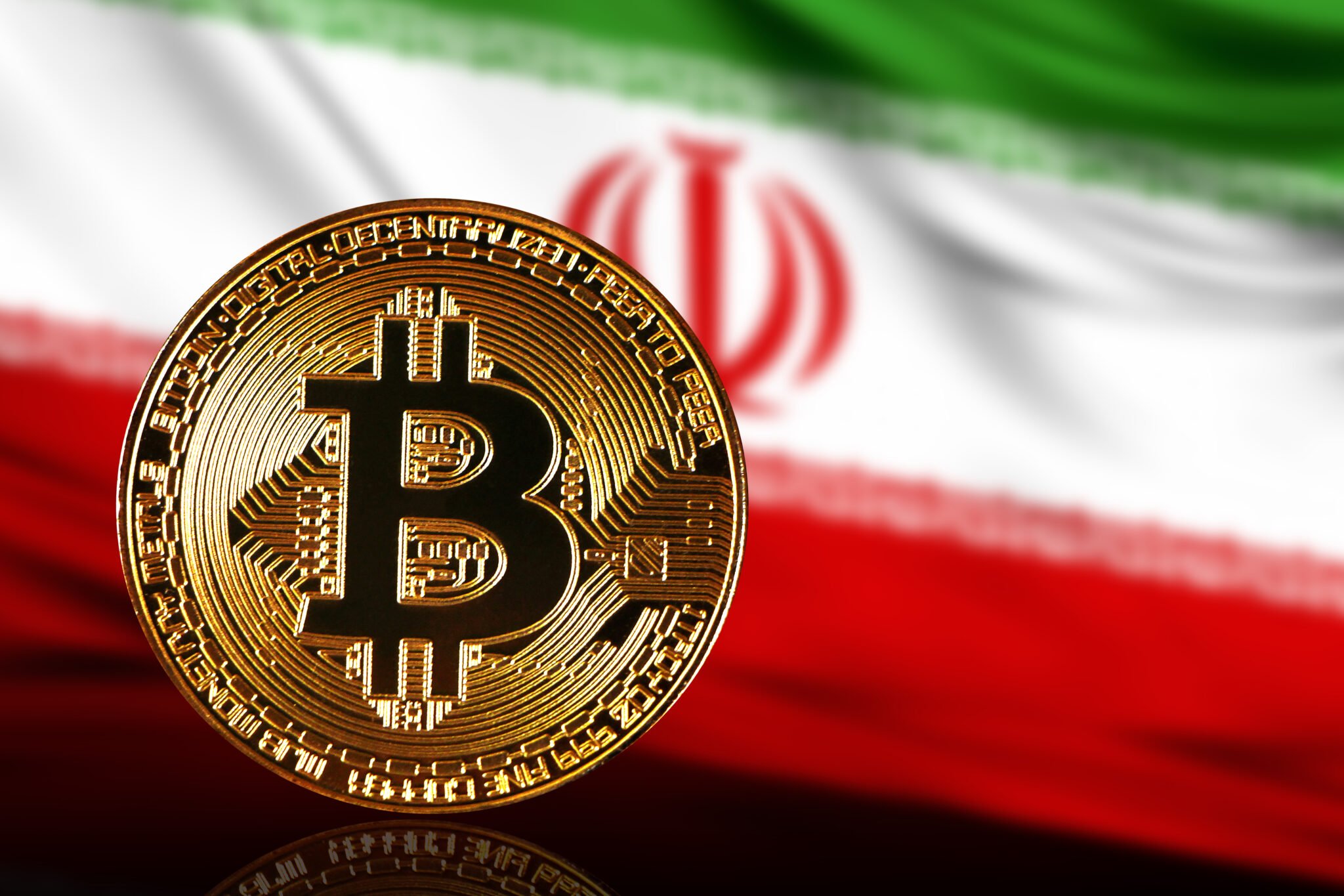 gold coin bitcoin on a background of a flag Iran