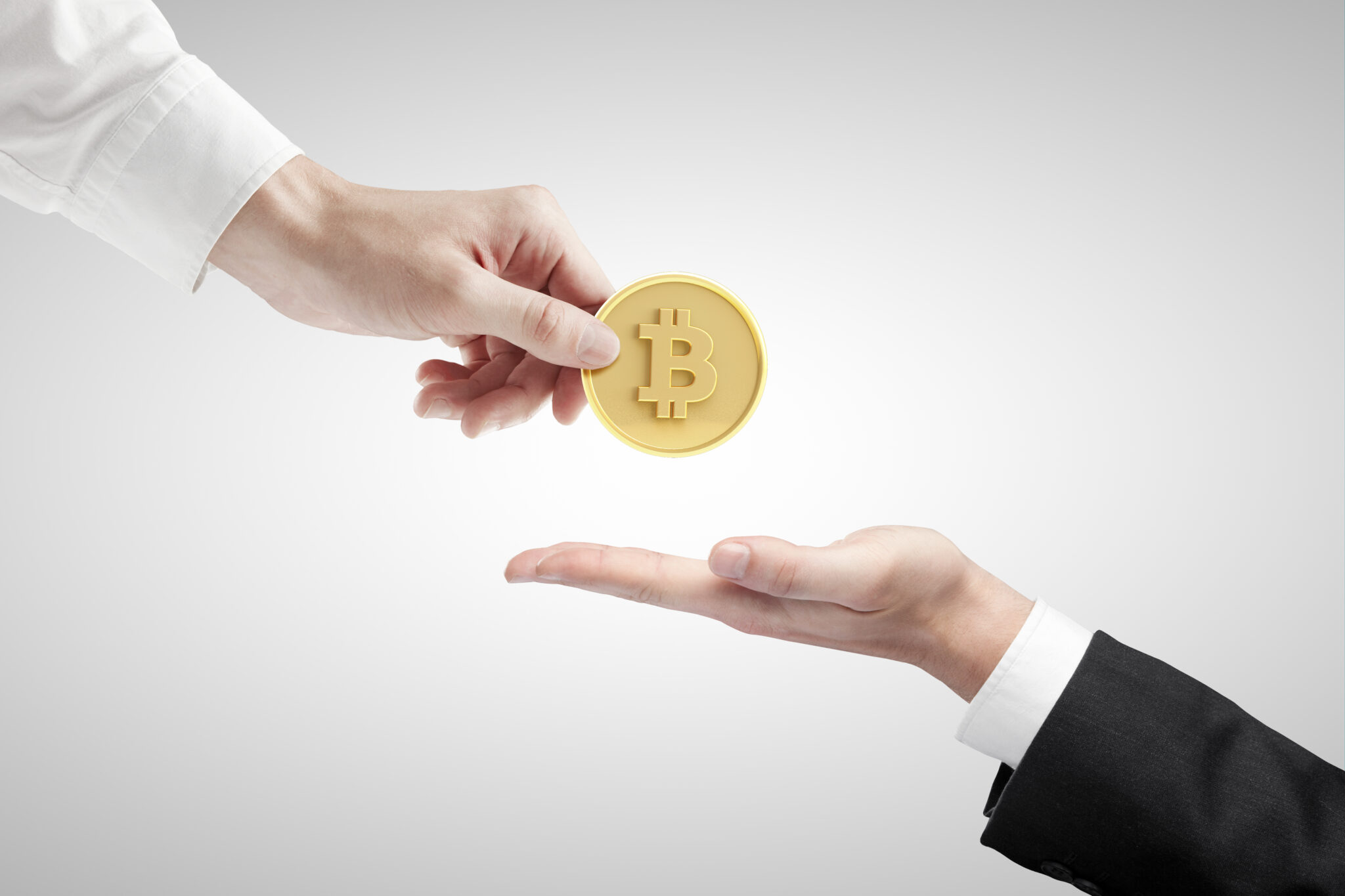 hand giving bitcoin