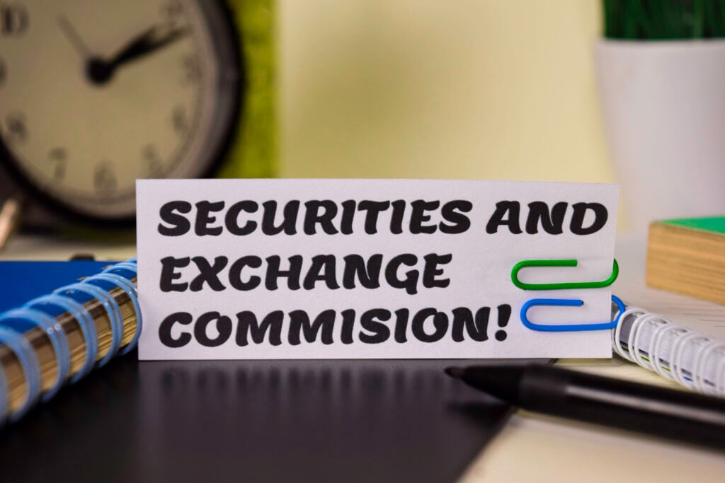 Securities and Exchange Commission!  on the paper isolated on the desk.  Business and inspiration concept