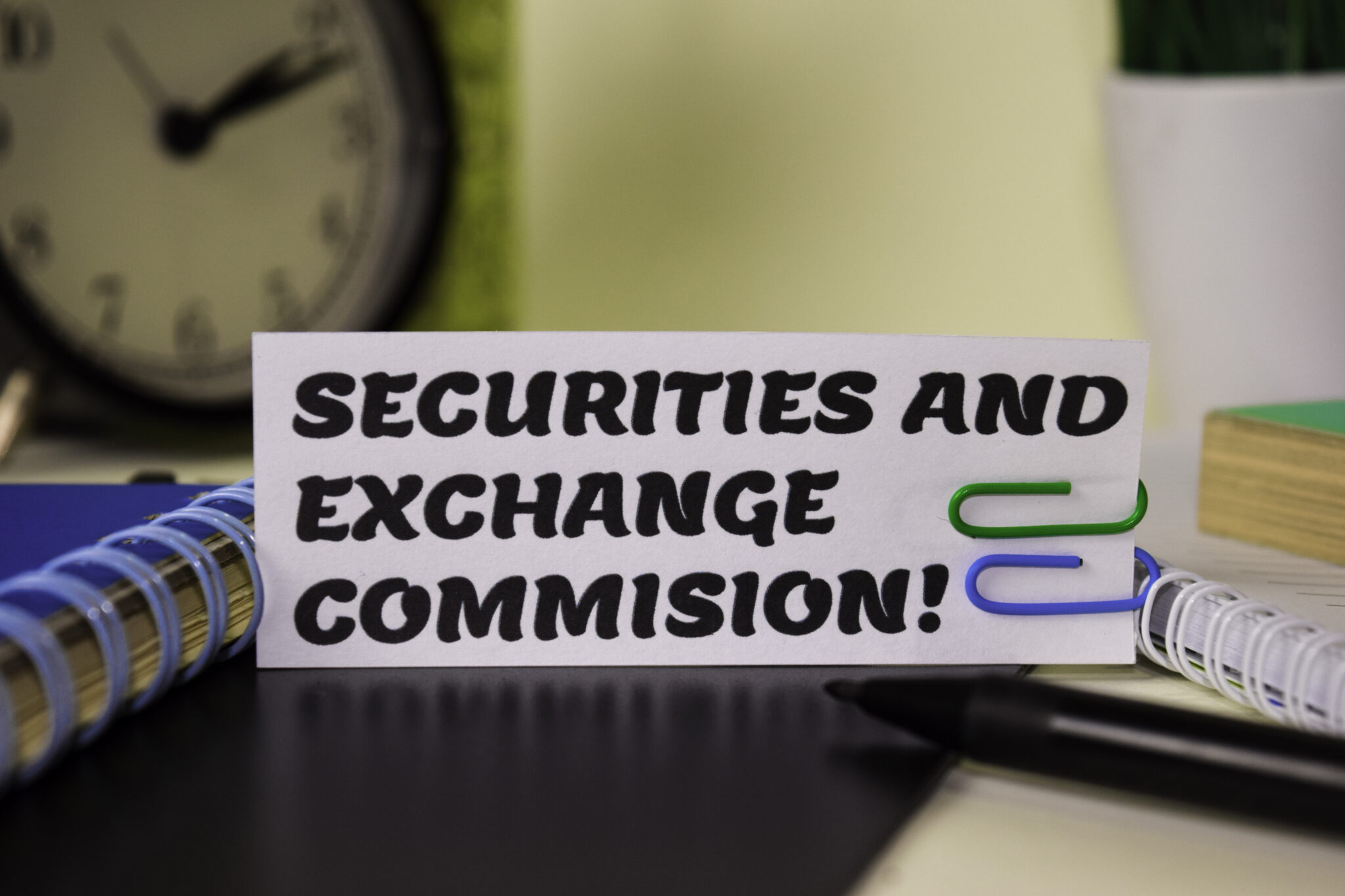 Securities and Exchange Commision! on the paper isolated on it desk. Business and inspiration concept