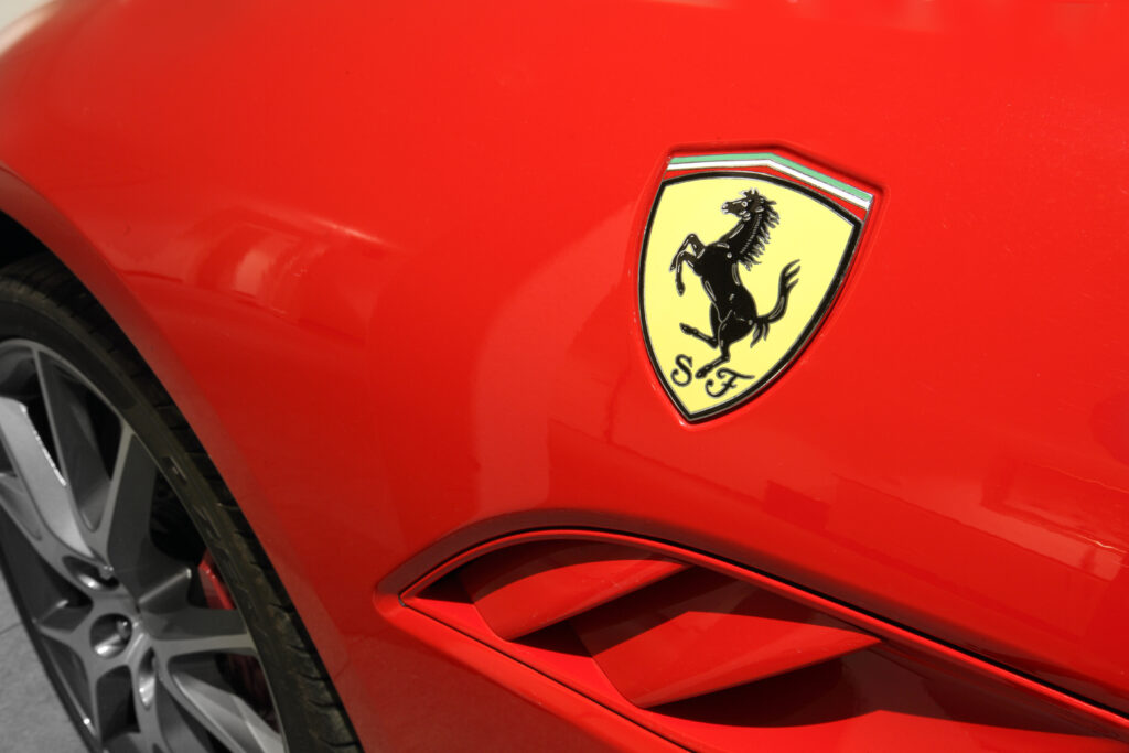 Ferrari Horse Logo Close Up on Red Car