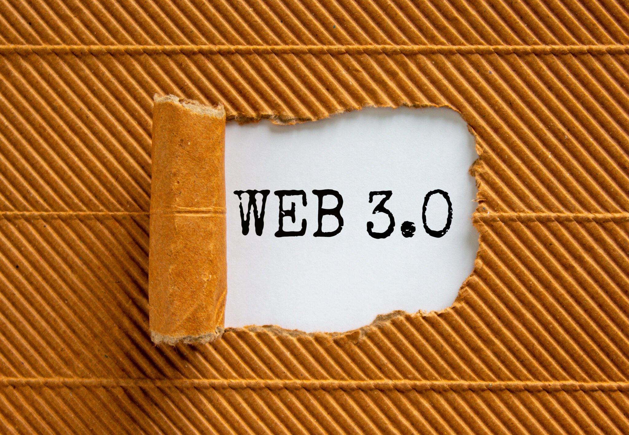 WEB 3.0 symbol. Concept words WEB 3.0 appearing behind torn brown paper. Beautiful white and brown background, copy space. Business, technology and WEB 3.0 concept.
