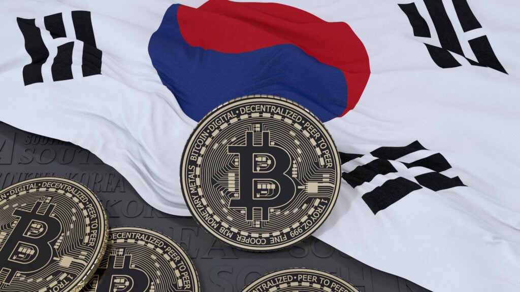 3d rendering of a metallic Bitcoin over South Korean flag cryptomonnaie