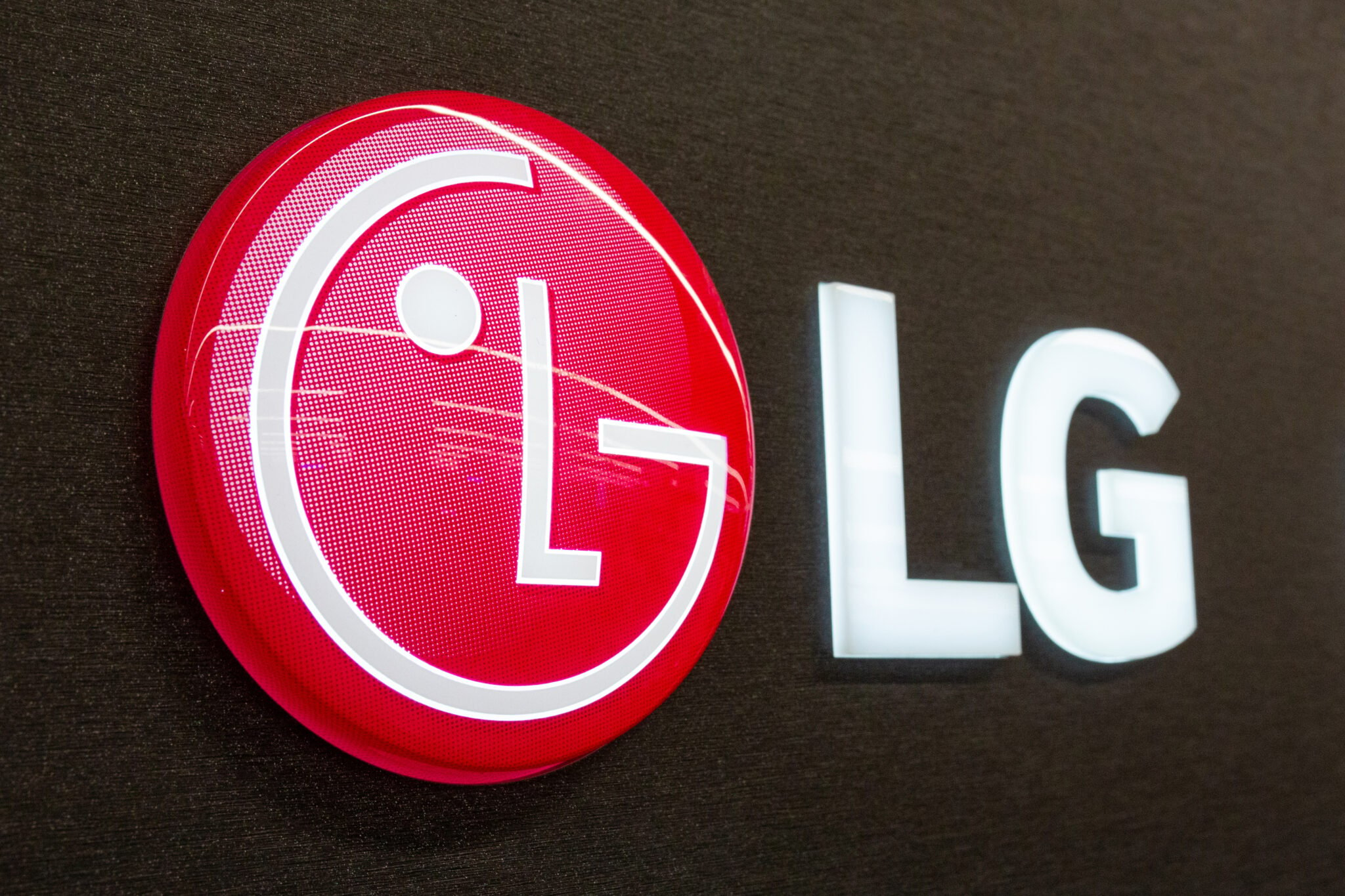 LG logo. Bright neon LG sign. South Korean multinational electronics company, LG Electronics. Minsk, Belarus - February 2, 2022