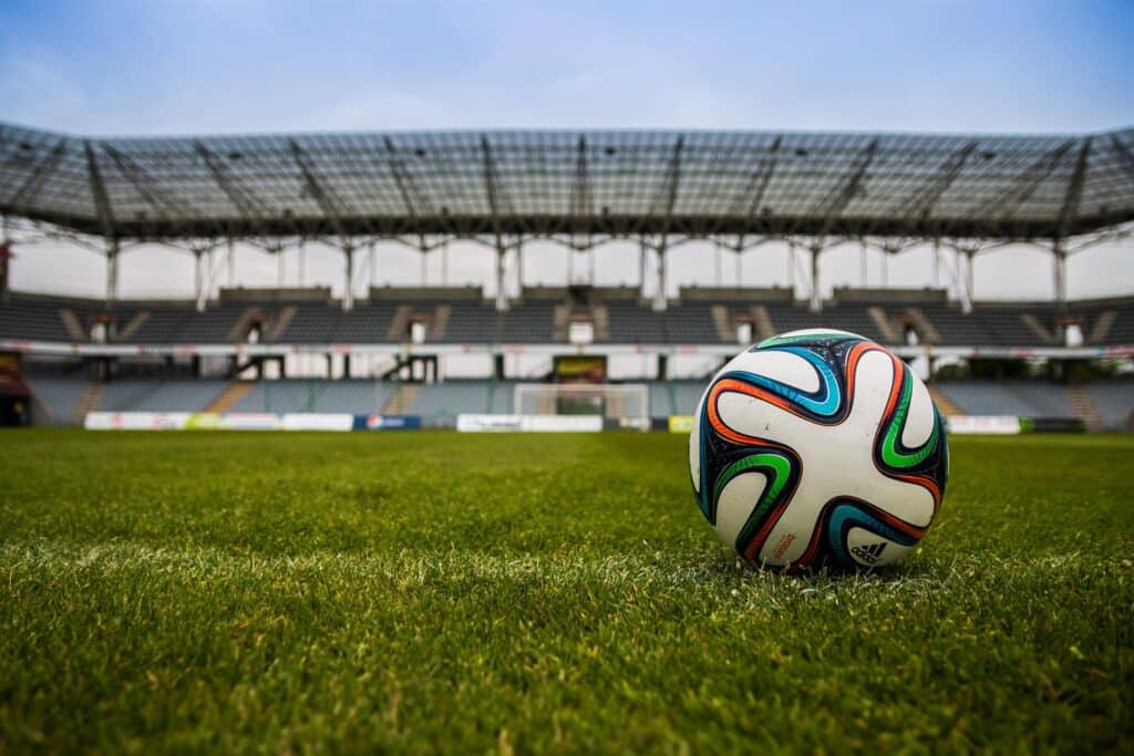 Soccer ball on grass field during daytime