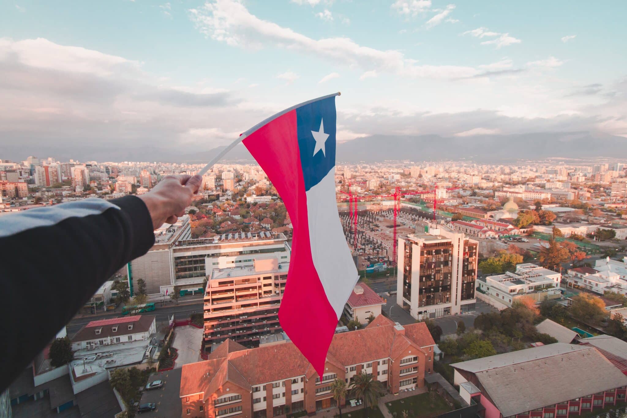 Chilean flag above Santiago city.