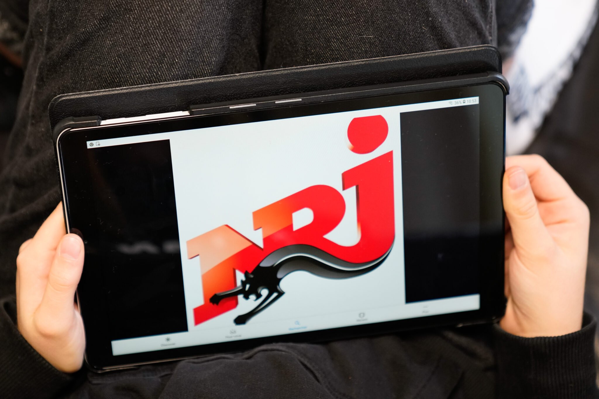 Bordeaux , Aquitaine / France - 11 25 2019 : nrj sign logo screen tablet private French radio station