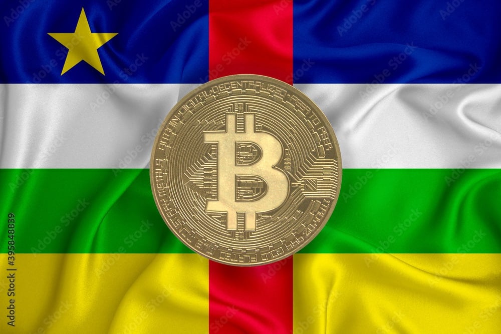 Central African Republic flag, bitcoin gold coin on flag background. The concept of blockchain, bitcoin, currency decentralization in the country. 3d-rendering