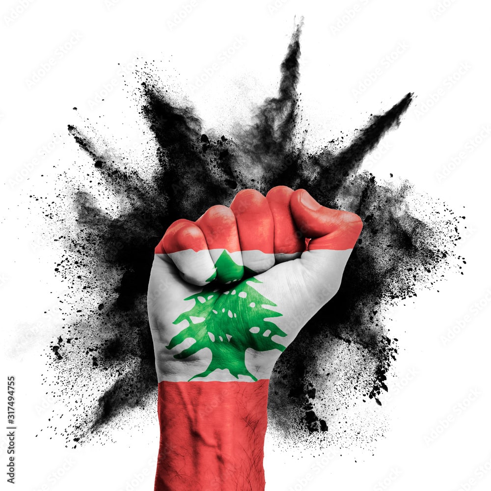Lebanon raised fist with powder explosion, power, protest concept