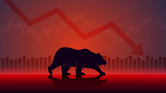 Un ours sur un fond rouge pour illustrer le bear market