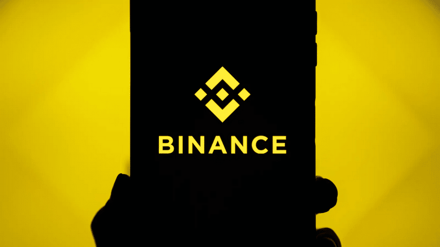 Le logo de l'exchage crypto Binance sur un téléphone