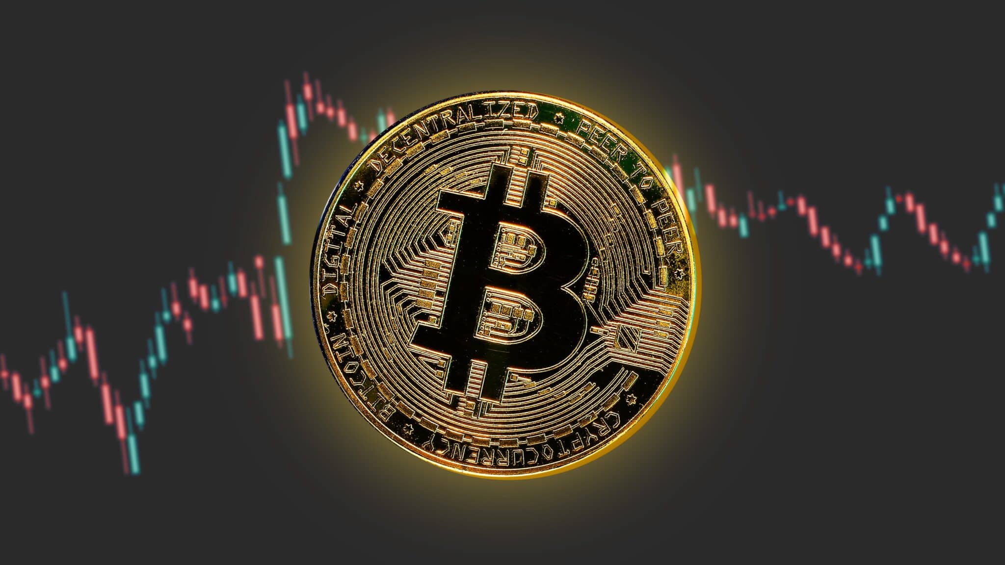 Une pièce de bitcoin sur un graphique de trading
