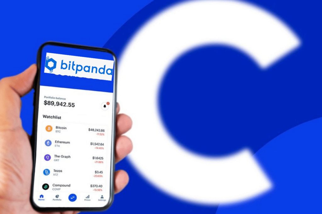 Un portable ouvrant l application Bitpanda et le logo de Coinbase en arrière plan