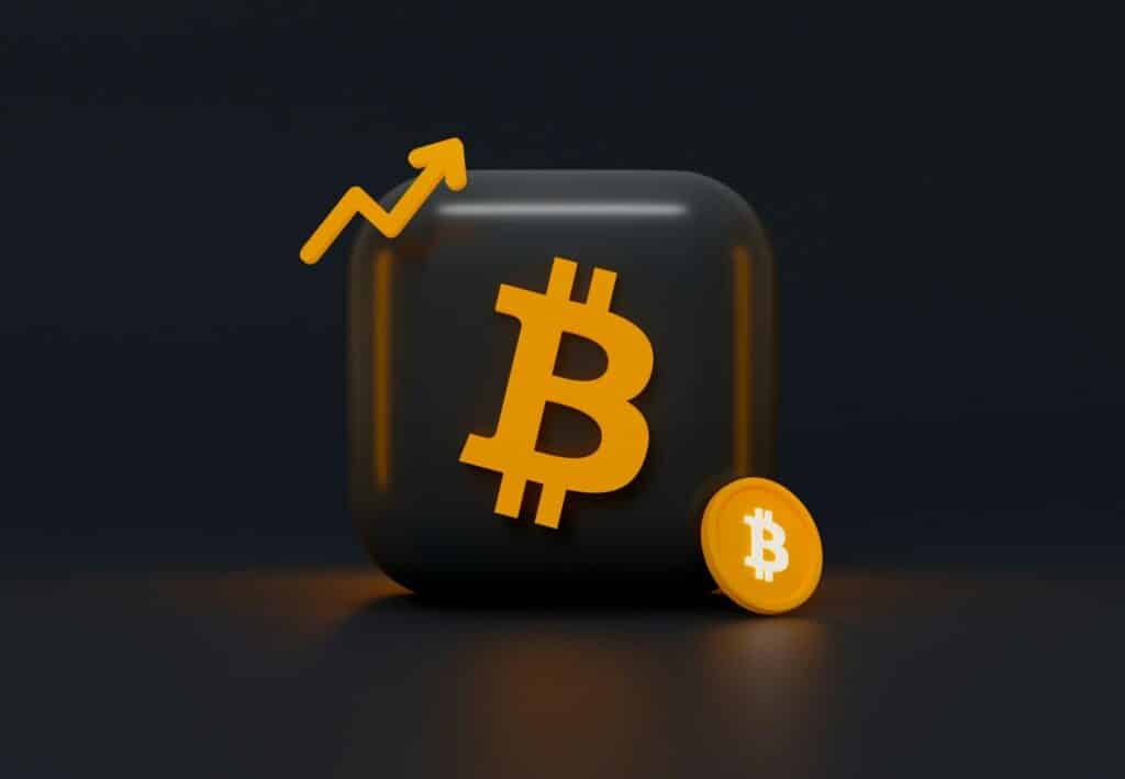 Logo du bitcoin sur une courbe ascendante