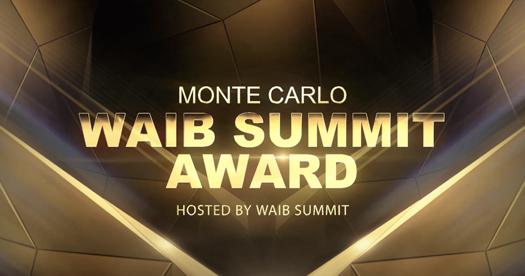 Golden text reads “Monte Carlo WAIB Summit Award” on a sleek, futuristic background with geometric light patterns.