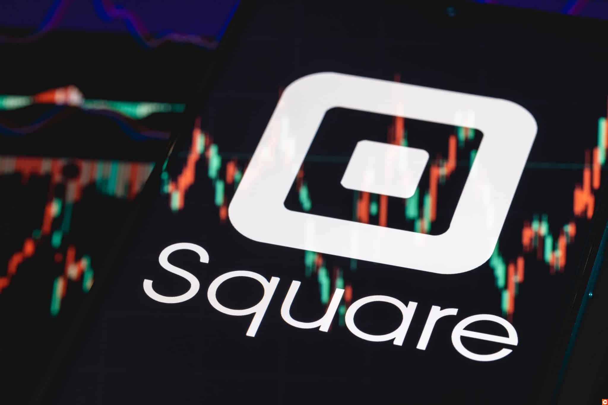 Kazan, Russia - May 30, 2021: Square is technology company that develops solutions for accepting and processing electronic payments. Square logo on smartphone screen. Stock chart in the reflection.